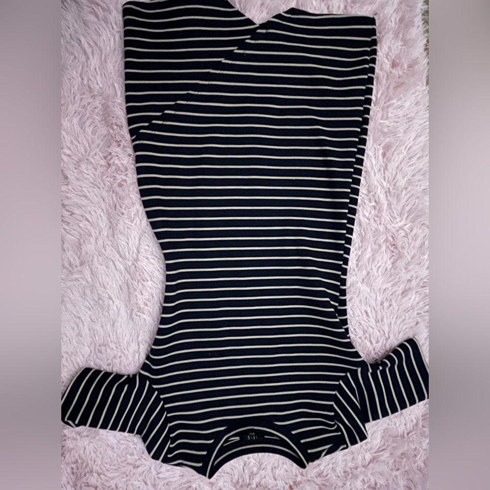 Black and tan form fitting dress